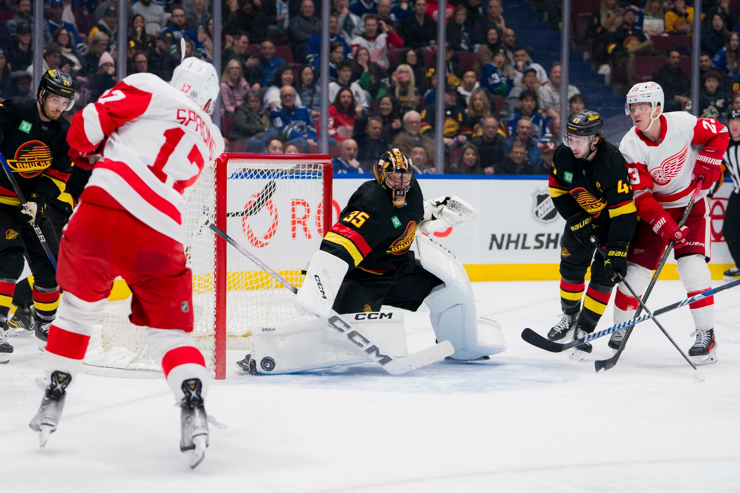 Daniel Sprong takes a shot on Thatcher Demko of the Vancouver Canucks.