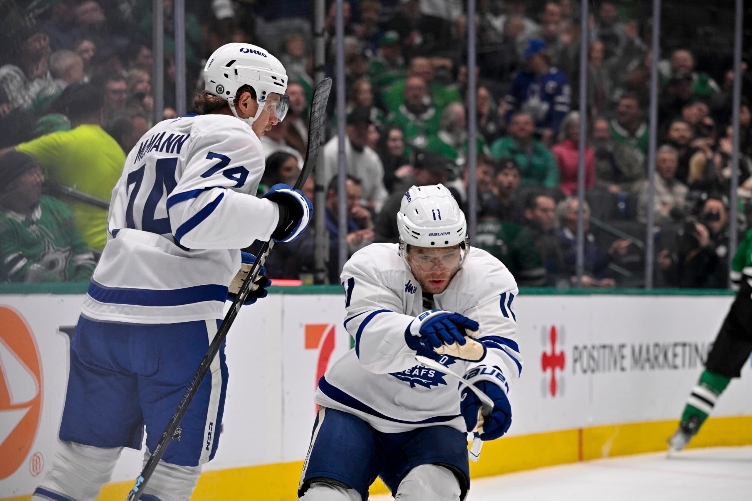 Max Domi and Bobby McMann of the Toronto Maple Leafs.