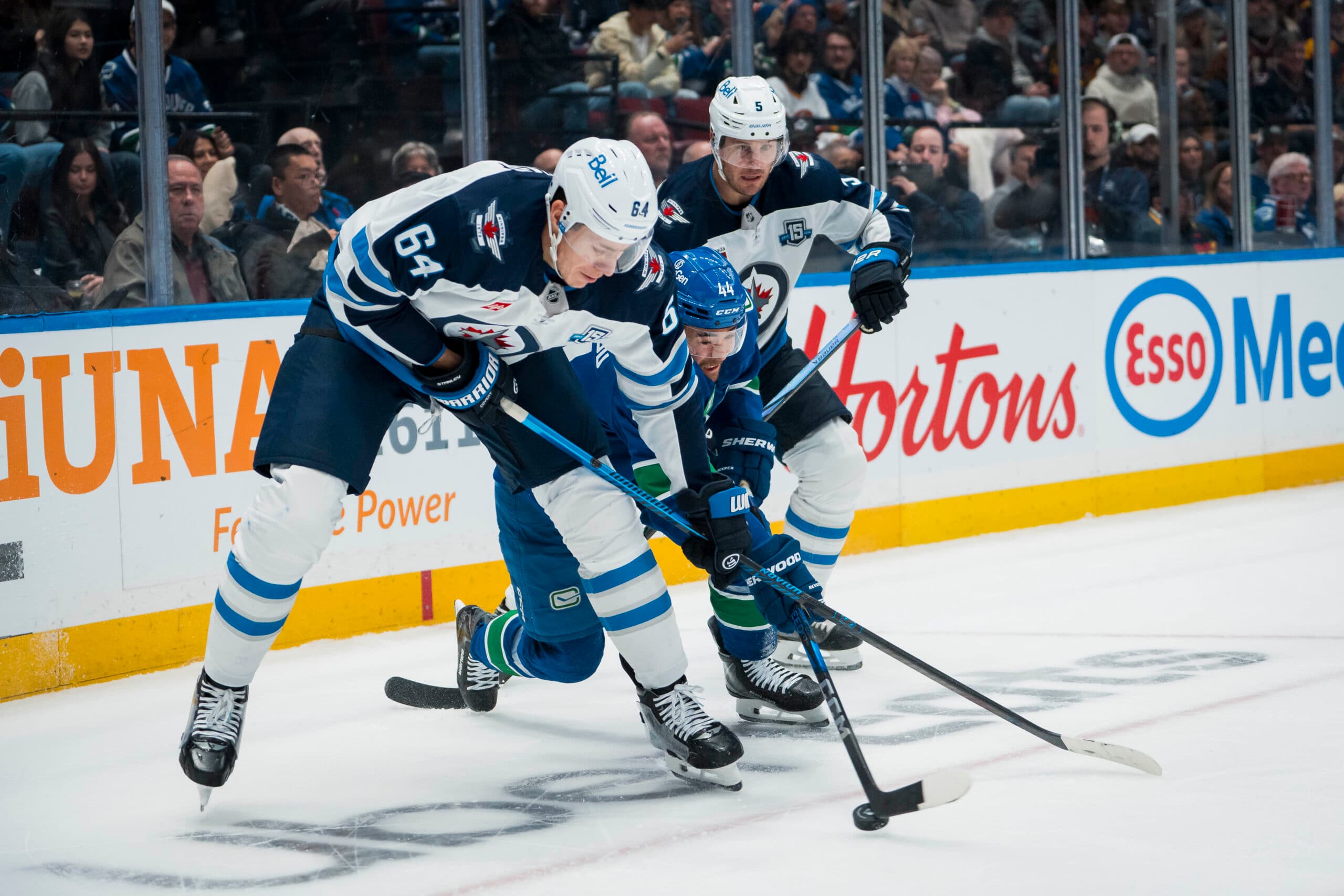 Winnipeg Jets defencemen Luke Schenn and Logan Stanley.
